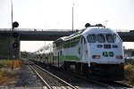 Westbound commuter shoves out of the station